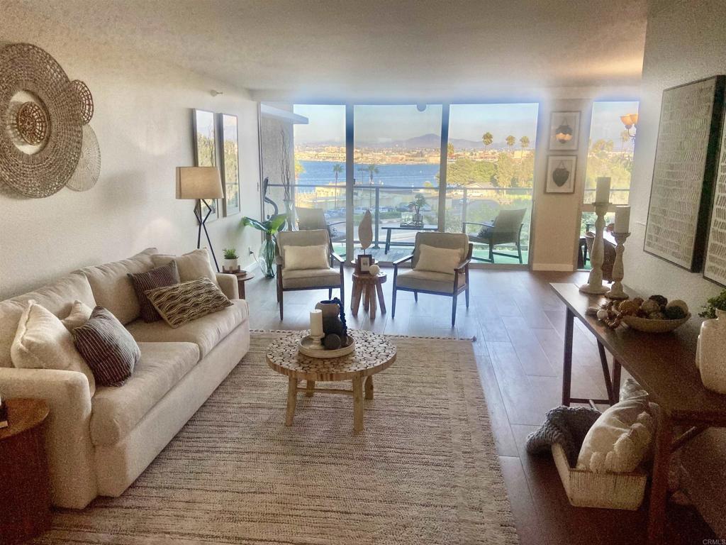 PRICE IMPROVEMENT! One of the lowest-priced units in The Shores—exceptional value and opportunity! This updated unit features two full bathrooms, a new air conditioner, and beautiful bay views. A true blank canvas—ready for your personal touch. Enjoy resort-style amenities, including a state-of-the-art gym, pool, jacuzzi, 7 tennis courts, 2 pickleball courts, and more. All within walking distance to the iconic Hotel Del Coronado and first-class dining. Don’t miss out—schedule your private showing today!