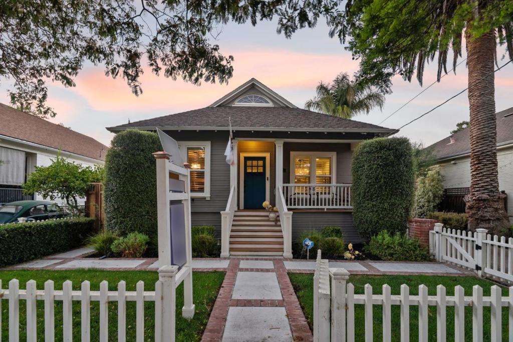 Pairing 21st century upgrades with classic Craftsman character, this remodeled and move-in ready single family home plus detached ADU (good for income generation or multi-generational living) offers almost 1,800 square feet of combined living space (1,267 sq ft 3 bed/2 bath main house and 517 sq ft detached designer ADU) in the vibrant heart of Shasta Hanchett Park, a short walk from CalTrain, Whole Foods, the Rose Garden, concerts and sporting events at the SAP Center, and endless local restaurants and coffee shops. Extensively fortified and upgraded both functionally and aesthetically, the laundry list of functional improvements include a sprawling, improved basement with a full vapor barrier, in-ceiling lighting, upgraded plumbing throughout, updated 200amp electric, updated central heat/air and ductwork, and professionally-installed hardscape with gated off-street parking. Solid oak hardwood floor, in-ceiling LED lighting, and dual pane windows; a fully-remodeled chefs kitchen with matching stainless appliances, farmhouse sink and garden window, a tasteful blend of solid wood cabinetry and floating shelving, quartz countertops, and Craftsman-appropriate subway tile from countertop-to-ceiling; solid wood doors; and two fully-remodeled spacious bathrooms. Swing by open houses!