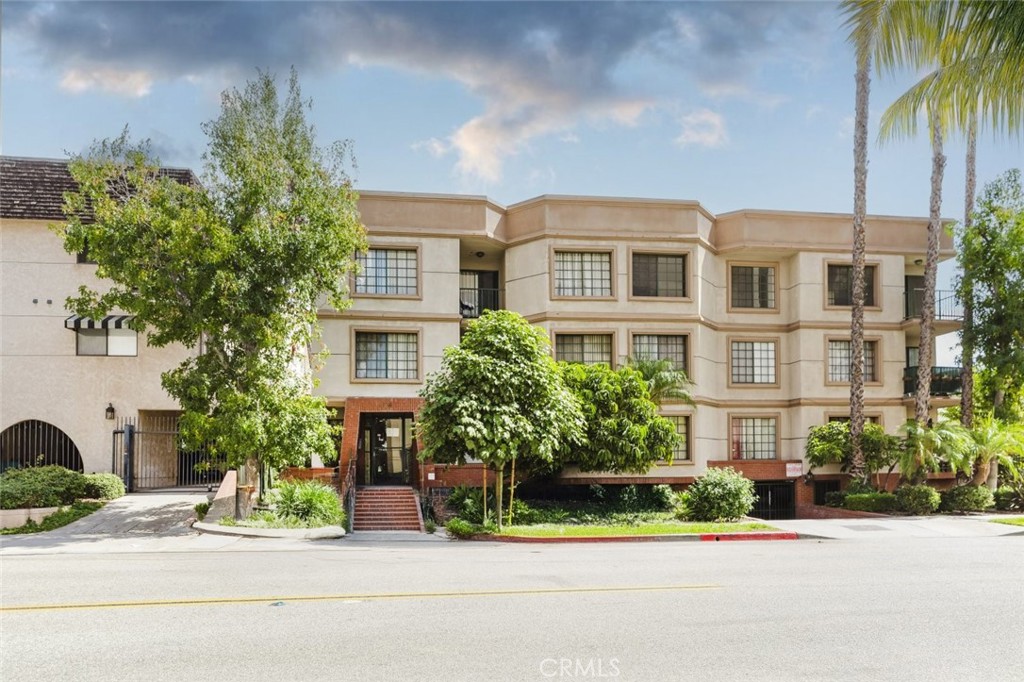 Welcome to 426 N Maryland Avenue - a bright and spacious 2-bedroom, 2-bath condo located in one of Glendale's most desirable neighborhoods. This inviting first-floor unit features an open floor plan with laminate wood flooring in the living areas, tile in the kitchen and baths, and recessed lighting throughout. The large living and dining area opens to a private balcony, perfect for relaxing or entertaining. The kitchen offers ample cabinetry, a gas stove, and a dishwasher. Both bedrooms are generously sized with plenty of closet space, including a primary suite with a walk-in closet and en-suite bath. Additional highlights include in-unit laundry, controlled access, and low HOA dues. Two assigned parking spaces in the community parking garage with controlled entrance. Ideally situated in the heart of Glendale's financial district - just moments from the Americana at Brand, Glendale Galleria, Porto's Bakery, and Brand Boulevard's shops, cafes, and entertainment - this home offers the perfect blend of comfort, convenience, and city living.