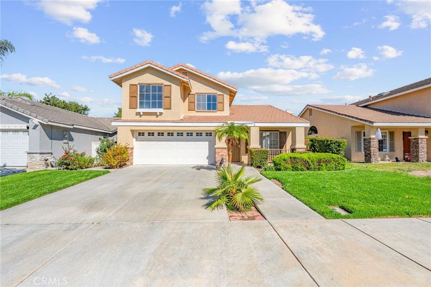 Welcome to 28570 Sand Island Way, a charming 4-bedroom, 3-bathroom home nestled in the highly sought-after Menifee Lakes community. This spacious residence invites you in with a bright and open living room that flows into a welcoming great room, perfect for both everyday living and entertaining. The kitchen features newer stainless steel appliances, a center island, and plenty of cabinet space, all opening seamlessly to the cozy family room highlighted by a classic brick fireplace ideal for cool evenings and warm gatherings. Downstairs, you’ll find a convenient bedroom and full bath, perfect for guests or multigenerational living, along with an indoor laundry room for added functionality. Upstairs, the primary suite offers a peaceful retreat with a spacious walk-in closet, dual sinks, and a separate soaking tub and shower. Three additional bedrooms and a full bathroom with a tub-shower combo complete the upper level, offering flexible space for family, work, or hobbies. Step outside to a backyard with endless potential, imagine designing your dream outdoor space, from garden beds to a relaxing patio retreat. The front yard has been refreshed with newer grass, offering curb appeal right from the start. Living in Menifee Lakes means more than just a home; it's a lifestyle. Enjoy access to community amenities like walking trails, a beach-entry pool, and even canoeing on the lake. You're just minutes from local parks, schools, shopping, and dining, all in a city that’s rapidly growing in popularity for its balance of convenience and community charm. Don’t miss your chance to call this home your own and be part of one of Menifee’s most desirable neighborhoods!