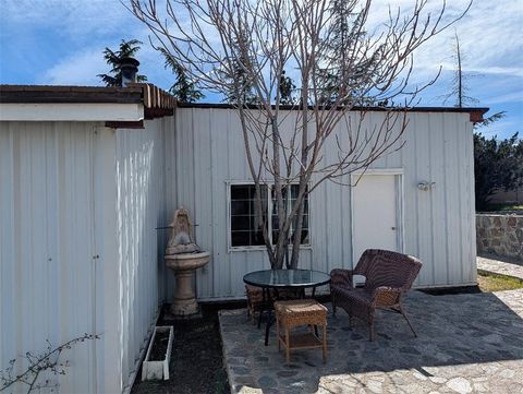 Photo of 2707 Sunnyslope Rd, Pinon Hills, CA 92372 (MLS # IV26039357)