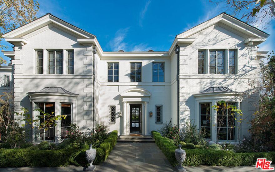 This Exquisite home reminiscent of the great manor homes of 18th century England resides on over an acre of land in the Pacific Palisades Riviera. Captivating views include the Pacific Ocean, downtown skyscrapers, San Gabriel Mountains, & Getty Museum. This home has a traditional floor plan w/ center entrance hall, gracious Living room, large gallery, library, formal dining room, eat-in chefs kitchen & butler's pantry, wood paneled family room & breakfast room, lavish master suite, state-of- the- art theatre, gym, staff quarters w/separate kitchen, offices, play room, pool, spa, including 7 beds & 13 baths. Spacious gardens w/ commanding views are ideal for entertaining & cozy private porches w/ hidden patios create a rambling wonderment of elegant living. This cr&#195;&#402;&#194;&#168;me de la cr&#195;&#402;&#194;&#168;me estate is for the most discerning buyer. This is the JEWEL of the RIVIERA.