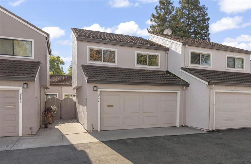 Perfectly placed in the highly sought-after South Park Community, in the heart of Santa Clara. Providing the ultimate location of convenience for a balanced Silicon Valley Lifestyle. You will find a well maintained pool and club house for enjoyment. The lush grounds surround you with nature. The ample guest parking and two car garage provide the space you have been looking for. The living room showcases soaring vaulted ceilings and oversized windows. The open layout is finished with Shaw LVP. Open dining area and private patio, perfect for daily living and entertaining. The thoughtfully designed kitchen with quartz countertops, a tasteful backsplash, ample cabinetry with modern hardware, and stainless steel appliances. The downstairs half bath is a well appreciated feature. The hallway closet and an attached 2-car garage with built-in shelving completes the main level. A spacious primary suite provides generous closet space, a ceiling fan with integrated light, and a private en-suite bathroom with a stall shower. Two additional bedrooms, each equipped with new ceiling fan lighting and spacious closets, share an updated full bath. Ideally near major tech companies, shopping, expressways and the airport, this home blends comfort and convenience in a prime Silicon Valley location.