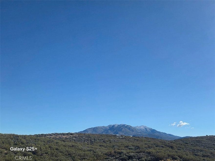 Private and secluded 20 acre parcel in the Santa Rosa Estates at the top of Anza with views of the San Jacinto and Santa Rosa Mountains along with views of the valley of Anza. Build your dream home under the stars with your horses or other animals in the quiet community of Anza. The Pacific Crest Trail is out the back gate of the community for riding. Bring your dirt bikes as there are endless trails in the Anza Countryside. Even though you are out in the country, Temecula is a short 45 minute drive or Palm Desert is only an hour away. The seller will carry a note on the property with favorable terms. The property has 100 amp service and well. The property also has a greenhouse for growing your plants and food.
Call with your questions