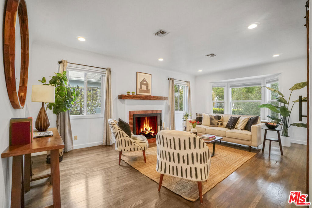 Beautifully updated 3 bed + 2-bath Santa Monica Bungalow home in the heart of Santa Monica. Thoughtfully remodeled and cared for, this home features a light-filled layout with spacious living areas, bonus rooms perfect for a home office, studio, or playroom, and a seamless indoor-outdoor flow ideal for entertaining. The solar energy system adds eco-conscious efficiency, while mature landscaping provides a peaceful, private setting. Nestled on a generous lot with impeccably landscaped, lush gardens, this property blends comfort, sustainability, and California charm. Located just minutes from world-class beaches, dining, and top-rated schools, this move-in-ready gem is a rare find in one of Santa Monica's most sought-after neighborhoods.