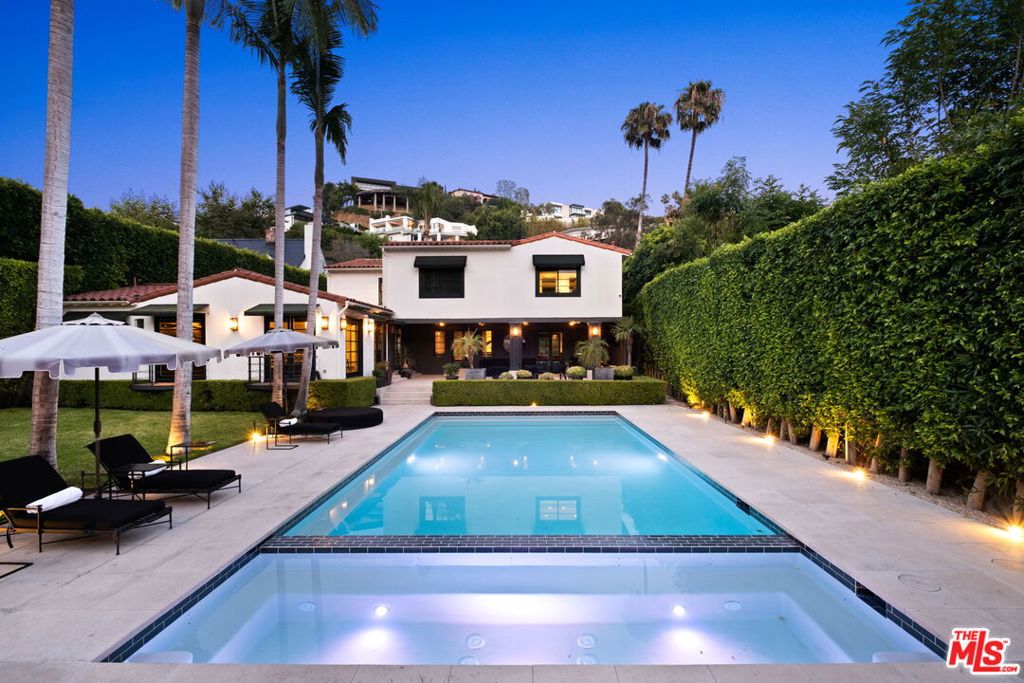 Available November 1st. This stunning California Mediterranean-style home has been impeccably updated, offering luxury and modern conveniences. This home features 3 bedrooms, 5 bathrooms, and a brand new 360 sq.ft. garage ADU complete with a bathroom ideal for guests or as a private workspace. Indulge in resort-style living with a half-court basketball setup, a newly plastered and tiled pool, and 500 square feet of lush backyard grass. The pool lounge boasts a TV and fireplace for relaxed evenings outdoors, while the covered bar area, outfitted with in-ceiling heaters and a TV, invites year-round entertaining. Inside, the home exudes elegance and state-of-the-art technology. The living room features a roll-down movie screen and a 4K projector, making it a true media haven. The primary bedroom is a personal retreat with its own TV, movie screen, 4K projector, steam shower, and two massive closets. Each bedroom is equipped with its own TV and Apple TV for entertainment. The entire house is integrated with Control4 smart home technology, allowing you to control TVs, lights, HVAC, pool heater, security cameras, and the front gate directly from your phone. With two laundry areas one upstairs and one downstairs this home offers the ultimate in convenience and sophistication. This is luxury leasing at its finest, blending Mediterranean charm with cutting-edge amenities.