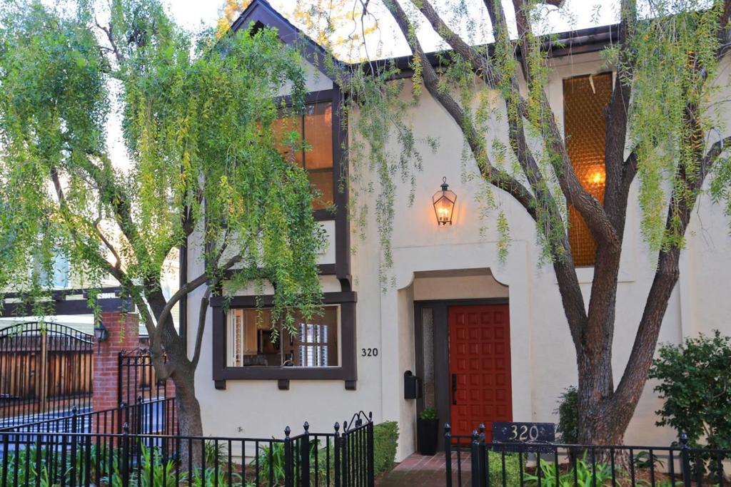 Renovated end-unit townhome in Downtown Palo Alto within a serene neighborhood offers 1,638 sq ft of living space, 2 beds, and 2.5 baths. Open floor plan with an abundance of natural light and quality finishes. Gourmet kitchen with stunning quartz counter tops, refrigerator, range, microwave, dishwasher and garbage disposal. A fireplace graces the living room, leading to a private back patio. The unit features European Oak hardwood floors, Central A/C and two spacious bedroom suites. In-unit laundry includes washer/dryer. The complex offers a sparkling pool and lush gardens. Landlord covers HOA, water, and garbage. Secured 2-car parking. Enjoy downtown amenities with proximity to Caltrain, Stanford, dining, and shopping. Outstanding Palo Alto schools.