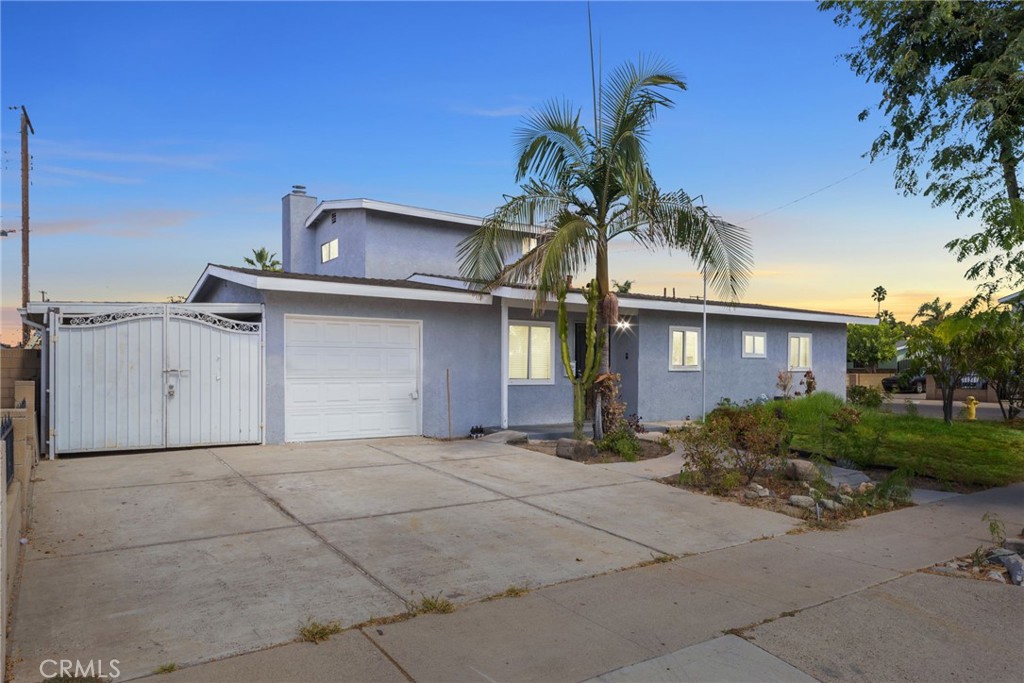 Welcome to a prime opportunity in East Anaheim! This corner-lot fixer-upper offers 4 spacious bedrooms and 2 bathrooms across approximately 1,927 square feet of living space. Situated on a generous 6,319 square foot lot, this home is full of potential for the right buyer ready to renovate and restore. The property features a flexible layout, abundant natural light from its corner positioning, and a sizable yard perfect for entertaining, expanding, or creating your dream outdoor retreat. This home is ideal for investors or homeowners looking to add value and personalize a space in a desirable Anaheim neighborhood. Bring your vision and make this home your next success story.