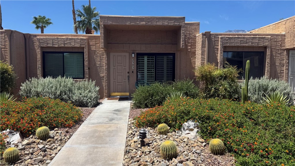 Welcome to 2303 Los Patos Drive—a stylish desert retreat in the heart of Palm Springs. This recently updated 2-bed, 2-bath condo is located in the highly desirable Villas De Las Flores community, where you're surrounded by mountain views, mature palms, and that signature mid-century charm. Inside, you'll find a completely new kitchen, high ceilings, and great natural light. The private patio is ideal for morning coffee, and one of eleven community pools is just steps away. The community also features two spas, tennis and pickle ball courts, a gym, book nook, and community space. Whether you're looking for a low-maintenance full-time residence, a weekend getaway, or a smart investment property, this one checks all the boxes. Just minutes from downtown Palm Springs, shopping, dining, and the airport. This is NOT a land lease; You own the land!