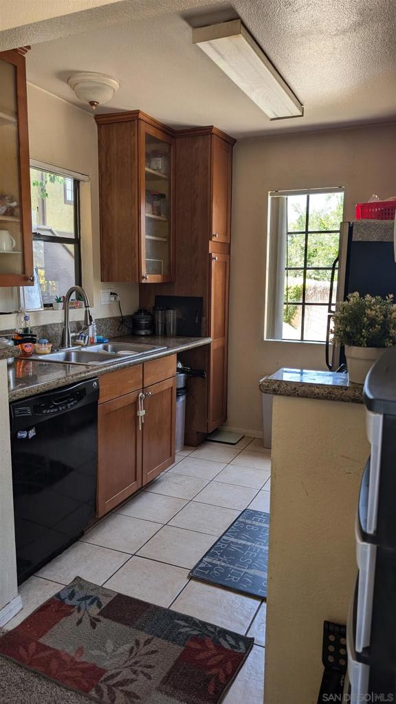 Experience modern living in this beautifully updated 2-bedroom, 2-bathroom condo located in the highly desirable community of Mira Mesa. This light and bright lower-level unit features brand-new stainless steel appliances, fresh finishes, and an open-concept layout that effortlessly blends comfort and style. The spacious living area opens to a private balcony, perfect for enjoying morning coffee or evening relaxation. Both bedrooms offer generous closet space, and the primary suite includes an en-suite bathroom for added privacy. Enjoy the convenience of in-unit laundry and two assigned parking spaces. The community offers resort-style amenities including a pool, spa, and lush landscaped grounds. Ideally situated just minutes from shopping, dining, parks, and easy freeway access, this turnkey home is ready for its new owner.