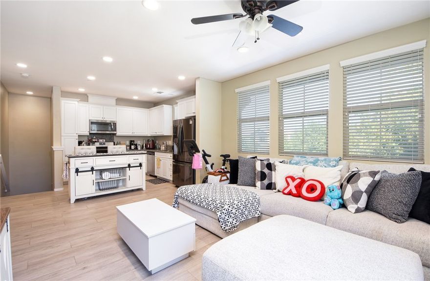 Welcome to 3410 E. Santa Clara Paseo #1 in Ontario Ca.  A Gem in the Heart of Ontario Ranch. Step into resort-style living in this beautifully designed townhome nestled in Ontario Ranch’s acclaimed New Haven community. This contemporary residence offers the perfect blend of comfort, convenience, and curb appeal. Ideal for first-time buyers, downsizers, or savvy investors. Thoughtfully crafted with an open-concept floorplan that maximizes space and natural light. The living, dining, and kitchen areas flow seamlessly together, perfect for entertaining or everyday living. A Well-appointed Chef’s Kitchen with stainless steel appliances, granite countertops, and ample cabinet space. Upgrades include luxury vinyl wood-style flooring, recessed lighting, designer finishes throughout. The primary Bedroom is generously sized. In unit laundry, central air conditioning, and smart storage solutions cater to modern needs. Residents enjoy access to community pools, spa, clubhouse, barbecue areas, dog parks, playgrounds, and landscaped gathering spaces. Connectivity & Convenience — Minutes to the 91, 60, and 15 freeways, making commuting a breeze. Close proximity to Ontario International Airport, Ontario Mills Shopping Center, and supermarkets.  The development is part of a well-maintained master-planned community with cohesive design, community oversight, and shared enjoyment of common spaces. Top-rated schools nearby, including elementary, middle, and high schools in the Chaffey Joint Union district. Don’t miss your opportunity to claim this inviting home in one of Ontario’s most desirable communities.