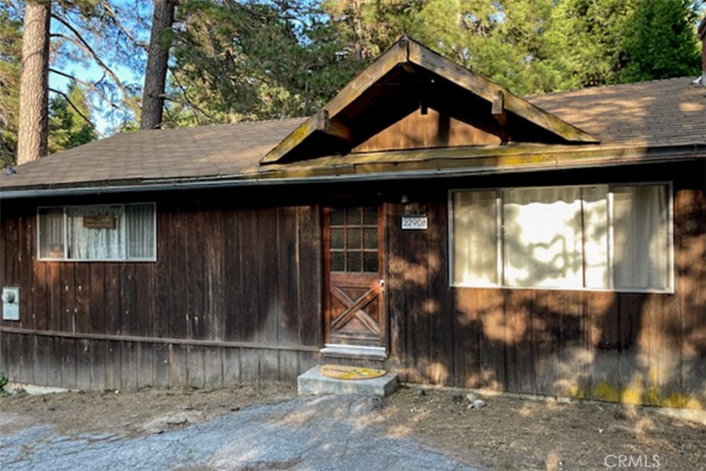 Welcome to Redwood Way! Located in the San Bernardino Mountains And Perfectly Placed In The "Valley Of Enchantment," This Cozy & Quaint Two Bedroom Home Has Much To Offer. Once Inside You Are Immediately Greeted By An Abundance of Natural Light, The Beautifully Aged Stone Fire Provides The Prefect Amount Of Charm While Adding Warmth On Cold Winter Nights . Spend Time Relaxing On The Rear Deck, While Taking In the Great Outdoors With Family And Friends. The Usable Back Yard Offers A Great Space For Entertaining, Playing Or Exploring, The Choice Is Yours, This Home Is A Must See That Is Sure To Please!