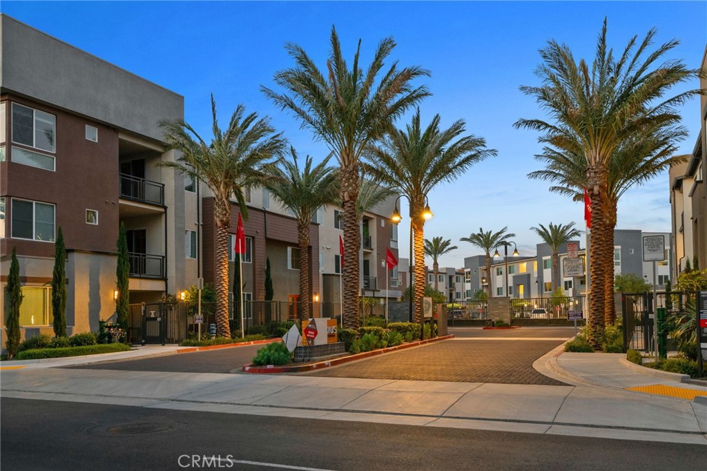 Modern Elegance Meets Convenience in the Heart of Ontario’s Premier Community
Step into refined Southern California living with this beautifully appointed Plan 3 residence in the highly sought-after Radius at Piemonte community. Located in one of Ontario’s most dynamic and centrally connected neighborhoods, this nearly new, meticulously maintained ground-level home offers effortless luxury and stylish comfort all on one level.
From the moment you arrive at the private, gated front porch, you're welcomed into an open-concept layout that exudes warmth, sophistication, and modern function. The expansive gathering room, seamlessly flowing into the dining area and gourmet kitchen, creates the perfect setting for hosting or relaxing in style. The oversized island, generous counter space, and upgraded Symphony Origin Design Package provide a designer finish to every inch of this entertainer’s dream kitchen.
Retreat to your serene primary suite with a large walk-in closet, dual vanities, and a tiled walk-in shower—your own private escape. A well-proportioned secondary bedroom is ideally situated near a full bath and a separate laundry room, offering both privacy and practicality.
Additional highlights include a RARE 2-car ATTACHED garage, a functional drop zone, and a smart layout that maximizes flow, space, and light. This residence has been gently lived in and impeccably cared for, showcasing a level of cleanliness and care rarely found in today's market.
Enjoy low-maintenance living in a master-planned community that places you minutes from shopping, dining, entertainment, major freeways, and Ontario International Airport—making it a commuter’s dream and a lifestyle destination all in one.
This isn’t just a home—it’s a lifestyle upgrade. Schedule your private tour today and experience what makes 4102 E Axis Privado #101 one of the Inland Empire’s most exciting turnkey opportunities.