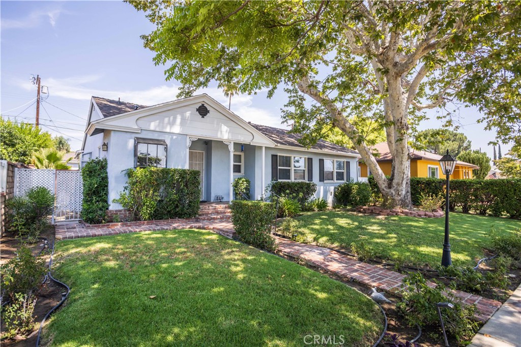 This beautiful home is nestled in one of Winnetka’s most sought-after neighborhoods and as soon as you lay your eyes on it you’ll immediately recognize the owners true “Pride-Of-Ownership.” Here are just a few of its many other outstanding features: Its lush landscaping, manicured shrubbery, colorful planters, mature shade tree, and extensive brick masonry enhance its eye-catching curb appeal. You’ll step into a flowing 1,327 square foot open concept floor plan that is in “Move-In-Condition” with elegant crown molding, a designer paint scheme and original hardwood flooring. The family’s cook is going to truly appreciate the galley kitchen’s abundant soft close cabinets and drawers, designer quartz counters, built-in appliances, deep basin sink, breakfast alcove, plus the convenience of adjoining dining room. All 3 Bedrooms have efficient ceiling fans; The grand suite also has built-in cabinets, and 2 closets with one with built-in organizers, plus bathroom with glass enclosed shower. A total of 1¾ bathrooms. Functionally located laundry room. Energy efficient dual pane window will help keep your utility bills low and the interior quiet. Central air and heating system for year-round comfort. Copper plumbing. You’re going to appreciate and enjoy the backyard’s tall privacy fencing, open patio, covered entertainer’s patio with ceiling fan and sparkling pool. 2 car detached garage; Perfect for an ADU conversion. All of this sits on a large 6,417 square foot lot that is close to Pierce College, The Village at Topanga, Topanga Mall, Orange Metro Line, and Warner Center with its entertainment and myriad of gourmet restaurants. So here is your chance to own a completely remodeled “Like-New” home
