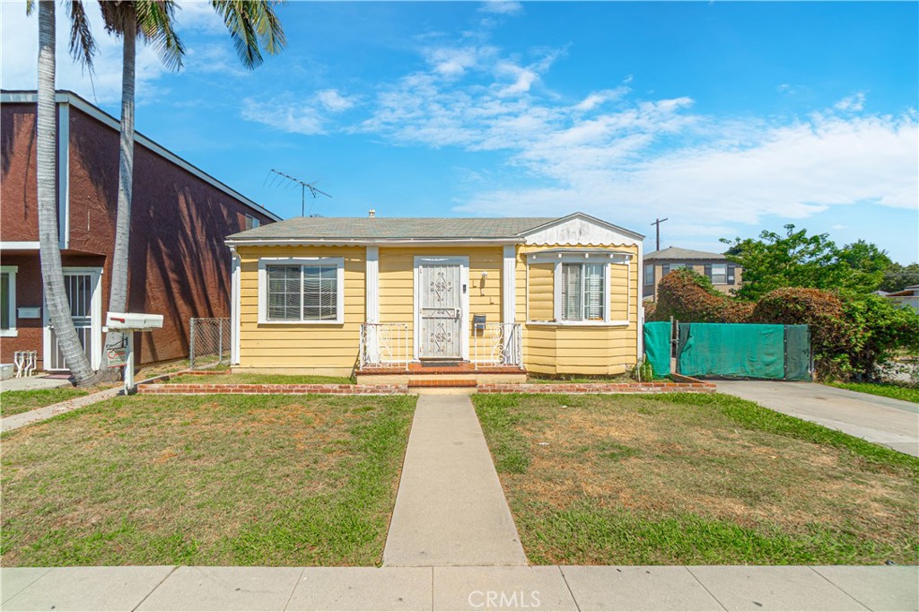 This versatile three-unit property in North Long Beach offers the perfect mix of rental income, private outdoor spaces, and modern upgrades.
The front home is a freestanding two-bedroom, two-bath residence with its own long driveway, two single-car garages, and a private backyard. It’s an ideal owner-user option or premium rental.
Behind the home are two additional units: a one-bedroom, one-bath and a studio. Both units enjoy private yard spaces and have been fully renovated with brand-new kitchens, baths, plumbing, and electrical systems. The two-bedroom home and the one-bedroom unit also feature in-unit laundry, a highly desirable amenity for tenants.
The studio will be delivered vacant at the close of escrow, giving the next owner flexibility to set a new rent or occupy the unit. Current rents are close to market, providing stable cash flow with room for growth.
This is a rare opportunity to own a turnkey triplex in one of Long Beach’s strongest rental submarkets—perfect for investors or those looking to live in one unit while generating income from the others.