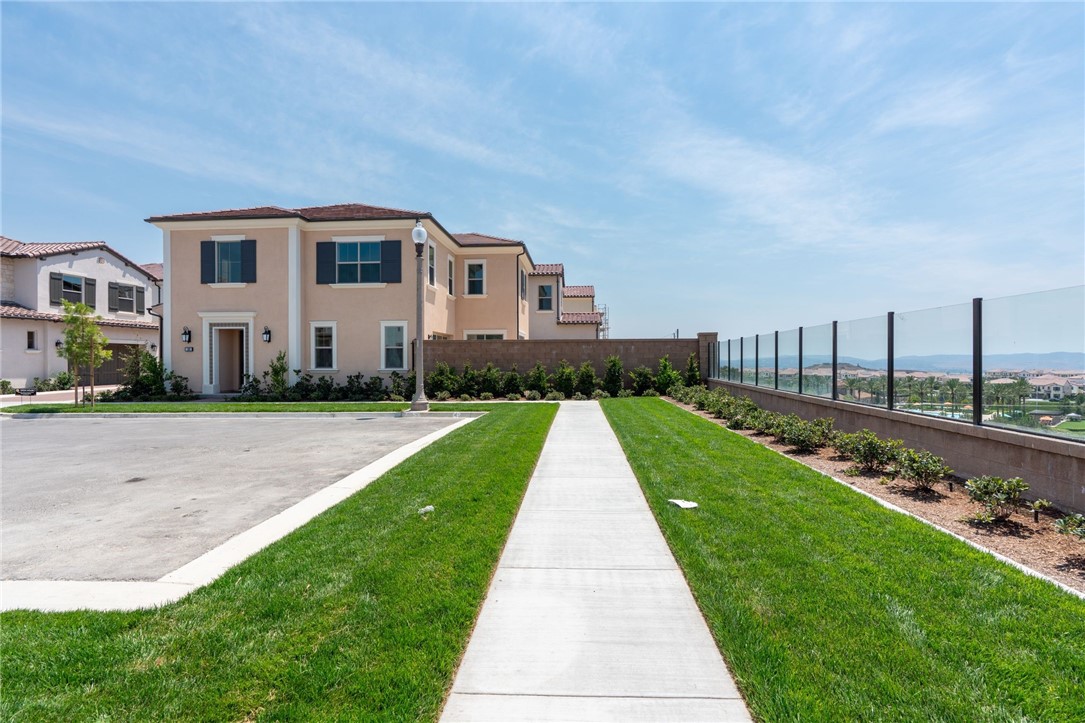 Views! Views! Views! Welcome to 100 Eversedge, Irvine, CA 92618 — a stunning brand-new home with unobstructed panoramic views. Perfectly situated on a private cul-de-sac corner lot, you can even see Catalina Island on a clear day!
Step inside this bright and airy home and you’ll immediately be greeted by a spacious, sun-filled living room that feels warm and inviting — the perfect place to call home.
Main Level:
• Expansive living room with abundant natural light
• Stylish kitchen with open layout features stylish Kitchen with upgraded cabinets and quartz counters, JennAir stainless steel appliances with SUBZERO REFRIGERATOR and large island with seating.
• Convenient 1/2 bathroom
• Attached two-car garage
Upper Level:
• Luxurious master suite featuring freestanding bathtub, shower, double sinks and walk-in closet.
• Three additional spacious bedrooms
Located in one of Irvine’s most convenient and desirable locations, the home is close to beautiful parks, top-rated schools, banks, and popular restaurants. You’ll enjoy easy access to South Coast Plaza, Irvine Spectrum Center, and freeways 241,133, 5, 55, and 405 — making commuting and shopping a breeze.
This is a must-see property to truly appreciate its beauty, comfort, and great location!
NOTE : ******** OWNER WILL INSTALL WINDOWS TREATMENTS & LANDSCAPING WITH PATIO & PUTTING GREEN
******** PAID OF SOLAR and WHOLE HOUSE FAN UNDER FEATURES ********