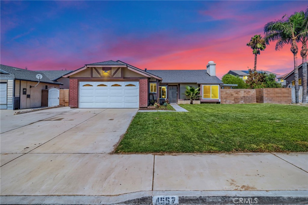 Introducing an updated 3-bedroom, 2-bath home with a bonus room in a quiet North Riverside neighborhood. Renovated in 2018, it features vaulted ceilings, recessed lighting, walnut laminate flooring, and an open layout connecting the living, dining, and family rooms highlighted by a fireplace. The kitchen offers quartz counters, espresso shaker cabinets, and stainless steel appliances.
The master suite includes high ceilings, a large closet, backyard access, and a bath with dual sinks, quartz counters, and a tiled shower. Secondary bedrooms are spacious with an updated bath featuring a quartz vanity and spa-style shower.
Enjoy a spacious backyard with a sunroom. Additional upgrades include dual-pane windows, a 2-car garage with direct access, newer A/C (2019), a newer water heater, a water softener, and a newer roof. Conveniently located near the 60, 91, and 215 freeways, just minutes from Downtown Riverside and UCR.