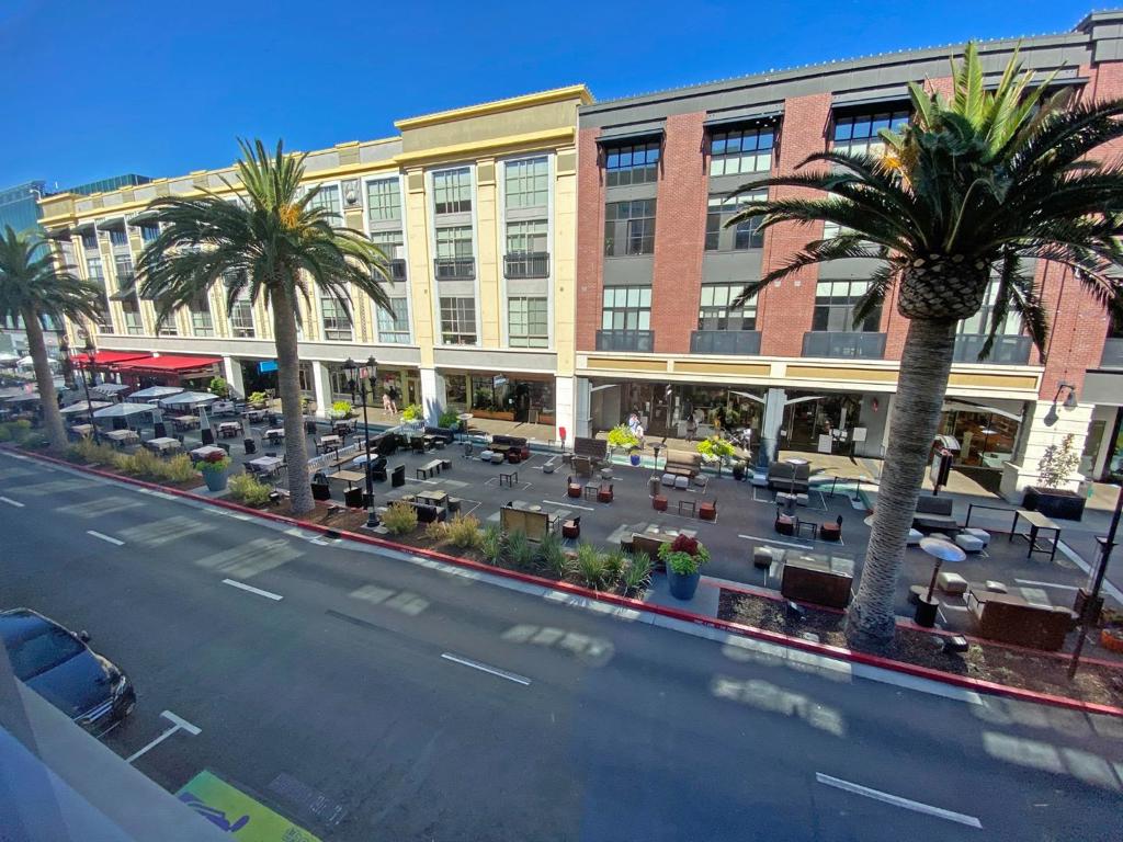 SEE VIDEO WALK-THROUGH LINK * LUXURY Living at Santana Row! Private Condo for Lease! * Fob Entry Behind Straits Restaurant -- Easy In-and-Out, with Designated 2-Car Garage Parking Nextdoor * Considered 2 Bedrooms,1.5 Baths, 1,250sf, 2-Story Loft * Smart Home with Front Door Combo Lock, Ring Doorbell, Nest Thermostat and Alarms, Lutron, Dimmable Lighting * Newly Remodeled, Laminate Flooring, Lots of Light! * Open Kitchen / Family Room Area w/ Granite Slab Counters, Whirlpool SS Appliances, and Pull-Out, Soft-Close Cabinets * Make the Upstairs Your Private Get-Away Complete with an Extra-Wide Platform for more Living Space, a Seperate Living Room, Bedroom, Bath, Walk-In Closet, and Work-Out Area * Master Bath Features Soaking Tub / Shower Combo, Towel Drying Rack, Wet and Dry Bidet Toilet, w/ Dual, Raised Sinks * Stackable Washer/Dryer In Unit. Water Included! A Must See!