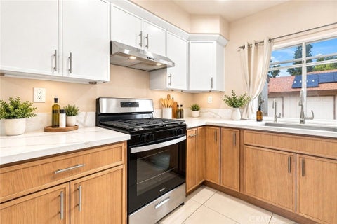 Photo of 1611 Raintree Place #D, Corona, CA 92879 (MLS # IG26196949)
