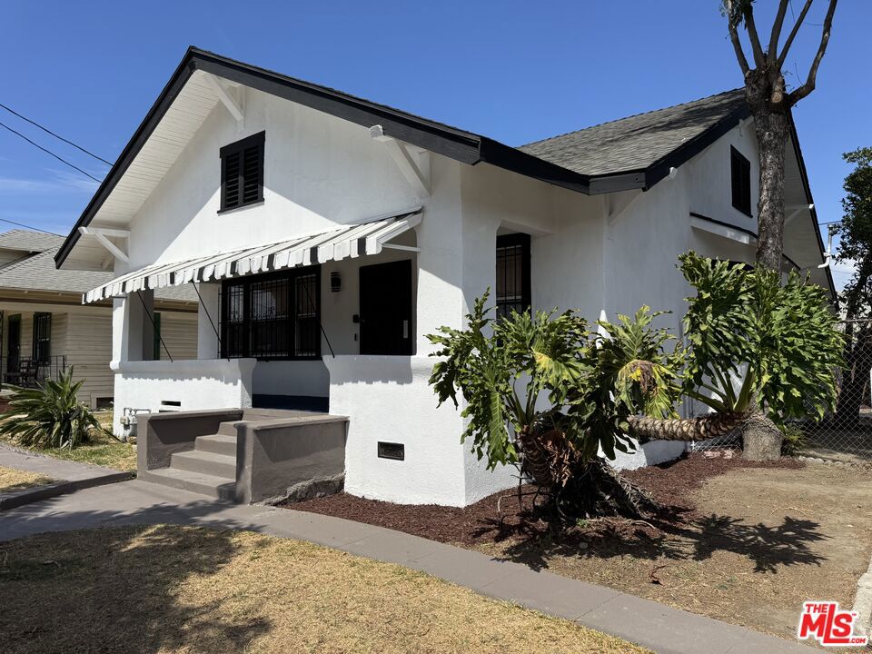 Once in a lifetime opportunity! Own a house completely redone for the modern buyer, all from top to bottom! This newly redone 3 bedroom, 1 bath property is a true gem in LA! Brand new plumbing, brand new electric, brand new recess lighting, brand new floors, new windows, brand new and exquisitely designed kitchen with brand new quartz countertops and appliances, brand new kitchen cabinets, new hood, brand new living room, brand new bathroom & shower, brand new vanity, brand new appliances, spacious rooms with closets, & much more complete the interior and welcome you into this amazing property. Backyard with fruit trees (lemon and orange), covered patio, garage and driveway, and basement all complete the property. Property is down the street from school, shops, & entertainment. Public records shows that the property is a 2 bedroom/1 bath, however, it is functioning as a 3 bedroom/1 bath and has more square footage than what public records show. Don't miss this opportunity!