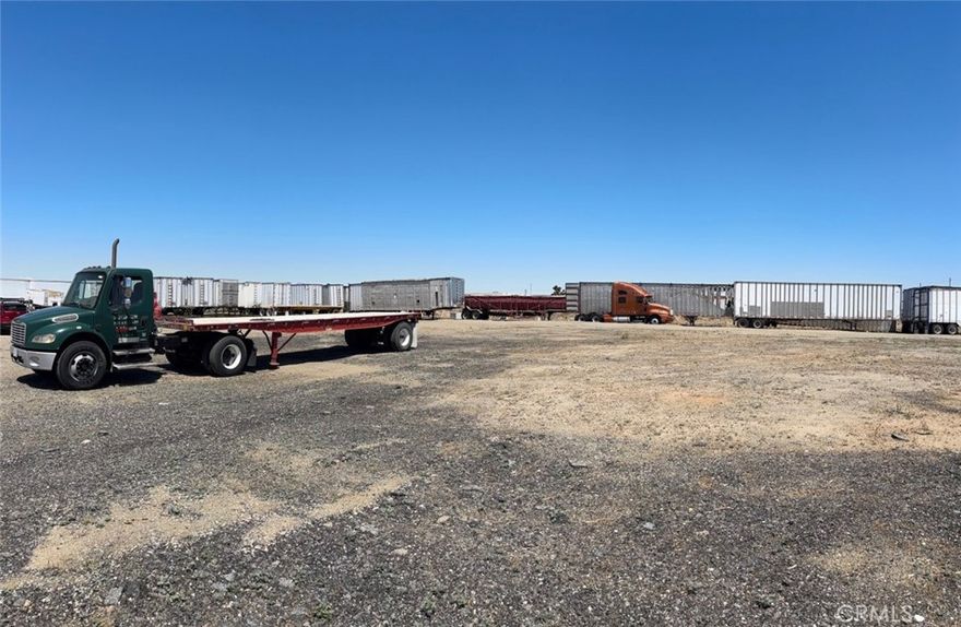 Rare opportunity to acquire 4.16 acres of heavy industrial land just down the road from the new Trader Joe's million-square foot warehouse and distribution center! This is a heavily traveled. main thoroughfare and just over one mile from the A.V. freeway. The property includes two older structures that have been grandfathered in, and the lot has been recently fenced. This property is able to accommodate numerous businesses and HI zoning allows for parking trucks, towing and other services. There is annual income from the billboard on this property and there is potential for income from cell tower(s) as well. Don't miss out on a chance to grow your business in the flourishing economic boom of the High Desert.