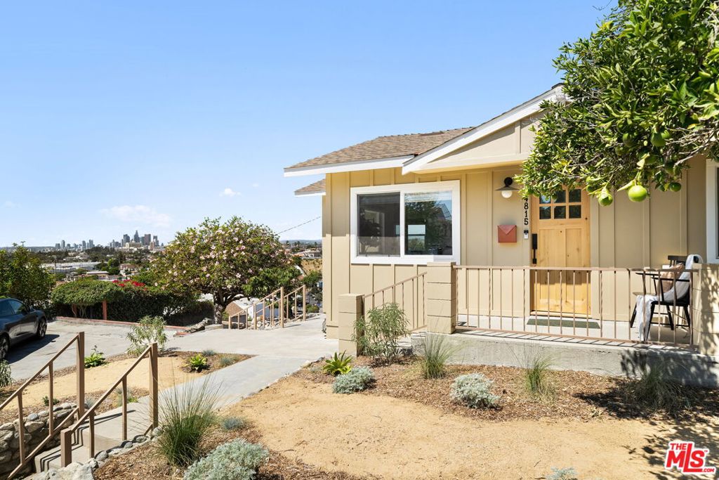 Located in the El Sereno neighborhood of University Hills, this 2-bedroom, 2-bathroom home offers wide, unobstructed views of Downtown LA, Ascot Hills Park, and the San Gabriel Mountains. The main level features an open living and dining area with great natural light and a clear connection to the views. Downstairs, there's a bonus space not included in the bedroom count that works well as a nursery, home office, or guest area. The layout is simple and functional, with enough flexibility to adapt as your needs change.Off-street parking for at least three cars adds real convenience in a neighborhood where that's not always easy to find. The home is close to Ascot Hills Park, with access to trails and open space, and just minutes from neighborhood staples like Lil East Coffee. You're also well connected to Cal State LA, South Pasadena, and Highland Park, with quick access to the 10, 710, and 110 freeways.This pocket of El Sereno has been quietly evolving, with more neighbors investing in their homes and building real community. The El Sereno Social Club, started by Andrew Rayas, brings people together through live music events, mezcal tastings, summer jazz nights in the park, supper clubs, film meetups, and casual hikes -- offering a sense of connection that's hard to find in most of LA.