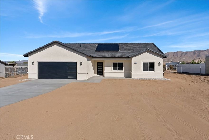 Move-In Ready New Construction with Modern Finishes!

Welcome to this stunning 3-bedroom, 2-bathroom home offering 1,700 sq. ft. of beautifully designed living space on an expansive 0.42-acre lot in the heart of Hesperia, CA. This brand-new home features modern finishes throughout and an open-concept layout perfect for entertaining. Enjoy peace of mind with paid-off solar panels, helping you save on energy costs from day one. With spacious bedrooms, a stylish kitchen, and plenty of outdoor space, this property is truly move-in ready — all it’s missing is you!