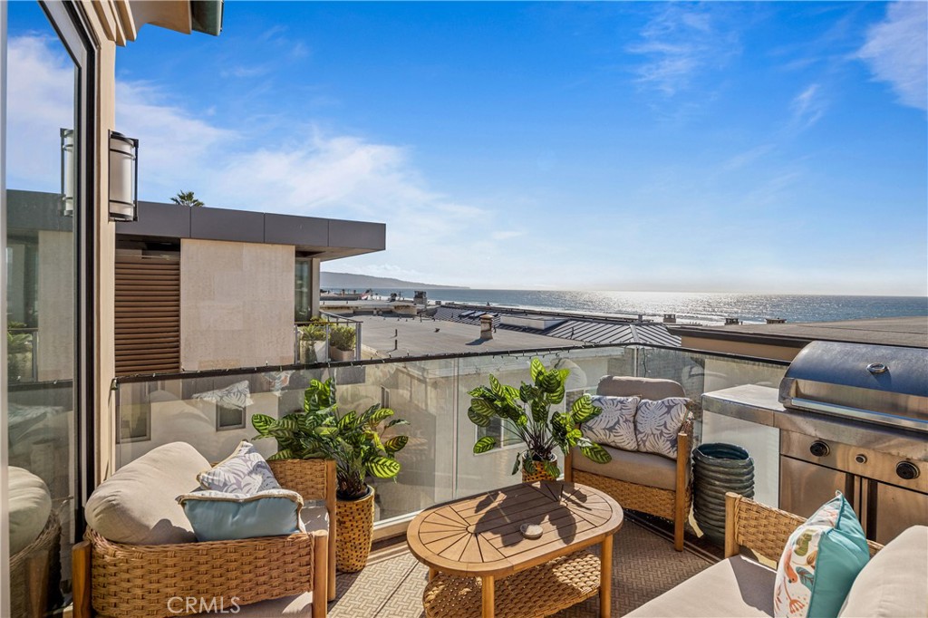Indulge in the ultimate coastal escape with this stunning, fully furnished short-term rental in Manhattan Beach’s exclusive south end. Just steps from the sand, this stylishly updated unit offers breathtaking ocean views and effortless beachside living. Both bedrooms feature luxurious ensuite bathrooms, while the upstairs level boasts an open-concept living and dining area, a chic half bath, and a spacious deck perfect for soaking in the sunsets. Experience the best of Manhattan Beach—where upscale elegance meets laid-back California charm.