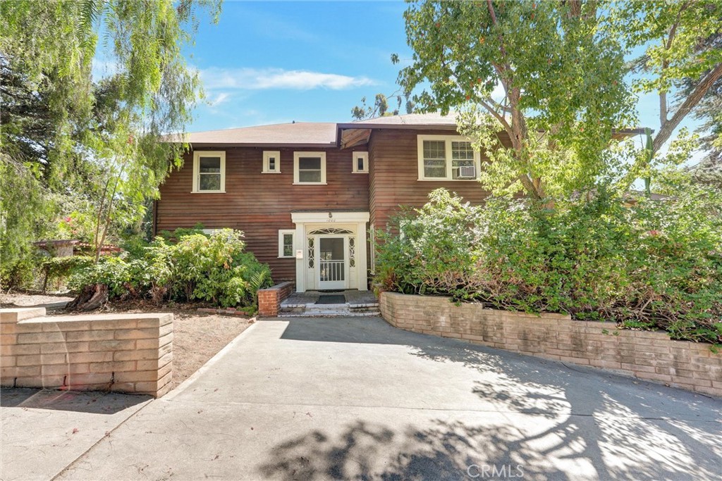 First Time on the Market Since 1911! Historic Glendora Estate with Endless Potential
Step into Glendora’s rich past with this incredible 4,400 sq. ft. estate, part of the original Glencoe Heights Ranch and former Big Four Ranch. Built in 1907, this rare American Foursquare/Craftsman-style residence sits majestically on over an acre of land, perched high above Foothill Blvd with sweeping valley and city light views.
Lovingly crafted entirely from California redwood, this home stands as a remarkable tribute to early 20th-century craftsmanship and the enduring strength of the mighty redwood. Offered for the first time in over a century, this property is truly one-of-a-kind.
Property Highlights: 6 spacious bedrooms (3+den w/closet upstairs, 1+den w/closet downstairs);
3 full bathrooms (1 downstairs, 2 upstairs);
Two separate living units with full-size kitchens and living rooms – perfect for multigenerational living, income potential, or restoring into one grand estate;
Solid oak flooring throughout;
Soaring 10'+ ceilings, oversized wood-framed windows, and custom-built wood entry doors;
Two unique fireplaces: a traditional brick hearth downstairs and a mid-century modern cast iron fireplace upstairs;
Enclosed sunrooms/deck rooms on both levels with panoramic views of the valley and city lights; and,
Generous-sized rooms with timeless architectural detail and character.
This iconic home offers both historical significance and versatile living options, whether you're looking to restore it to a single-family residence or continue with its current two-unit configuration. The expansive lot provides room for outdoor entertaining, gardens, or future development.
A rare opportunity to own a piece of Glendora history. Don’t miss your chance to explore the possibilities and make this landmark estate your own.
Schedule a private tour today and experience the legacy of Glencoe Heights Ranch.
