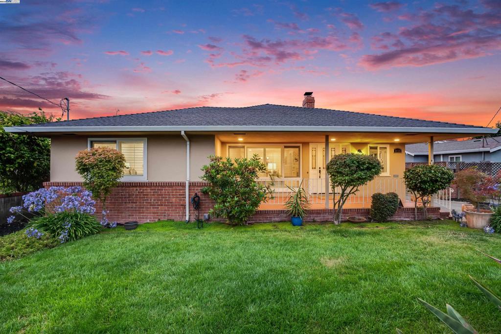 Located on one of Castro Valley’s most desirable streets, this charming ranch-style home sits in the heart of Downtown—just blocks from Castro Village, the Castro Valley Marketplace, BART, & Castro Valley High School. Enjoy a walkable lifestyle with shops, restaurants, & amenities just steps away. The home offers 3 bedrooms, 2 full baths, & nearly 1,700 sq ft of well-designed space. The cozy living room with fireplace flows into the formal dining area—perfect for gatherings. The kitchen features ample cabinetry, granite countertops, & a bright breakfast nook overlooking the landscaped front yard. Additional features include an indoor laundry room, hardwood floors, skylights, central A/C, recessed lighting, crown molding, & ceiling fans. The fully fenced & landscaped property includes a commercial-grade HydraWise irrigation system & RV/Boat parking. The front yard offers standout curb appeal, while the backyard features three large sheds—one with electrical. Relax with coffee on the front porch or dine al fresco in the tranquil backyard. Close to major Bay Area job centers, BART, Lake Chabot, parks, & an 18-hole golf course. Castro Valley is known for its top-rated schools & thriving downtown, with favorites like The Breakfast Club, Philz Coffee, Canyons BBQ, & Tony’s Pizza.