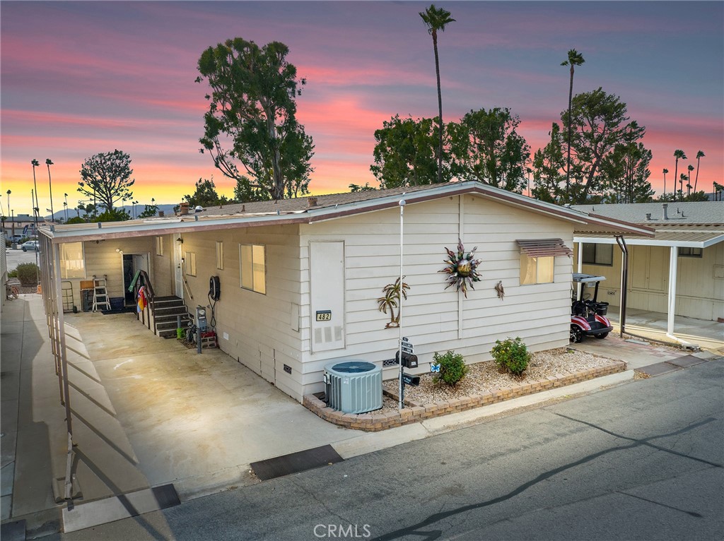 Welcome to your dreamy retreat, where every day feels like a vacation! Nestled in the idyllic 55+ golf community, this charming mobile home boasts stunning lake and golf course views, perfectly positioned just a stroll away from the clubhouse. Imagine sipping your morning coffee on your screened porch, enveloped in a serene atmosphere where you can gaze out at the tranquil water while enjoying the shade and privacy that surrounds you.
Step inside to discover a beautifully renovated space that exudes warmth and comfort. The open floor plan seamlessly connects the upgraded kitchen to the inviting living areas, creating a perfect backdrop for entertaining friends or cozy nights in. With a modern aesthetic and thoughtful design, the kitchen features sleek countertops and stainless steel appliances, including a brand-new fridge that’s just waiting for your culinary creations. For those seeking a bit more room, the finished California room has been expertly transformed into a home office, providing a quiet sanctuary for productivity or creativity. This additional living space is a true gem, allowing you to work or relax without ever feeling cramped. Rest easy, knowing this home has been meticulously maintained with significant upgrades throughout. The roof is only four years old, and the new AC system—installed just three years ago—ensures year-round comfort. The new dual-pane windows on the west side of the home keep the heat at bay. You’ll appreciate the new plumbing that runs throughout and the new flooring that adds a fresh, modern touch to every room. Storage will never be a concern here, as the property has a HUGE storage shed that can accommodate all your outdoor gear and seasonal items. Enjoy added convenience with your indoor laundry, with both washer and dryer included. But it’s not just the home that makes this property special; it's the lifestyle that comes with it. Experience resort-style living surrounded by beautifully manicured golf courses and five picturesque lakes perfect for fishing. Engage in the buzzing community spirit with well-attended events like live bands, dancing, and delightful taco Tuesdays. There’s always something happening, ensuring that you’re never short on fun or friends. This property isn’t just a home; it’s an invitation to a life filled with leisure and enjoyment. Embrace the opportunity to live in a community that offers not just a residence, but a vibrant lifestyle. Come and see for yourself—your perfect oasis awaits!