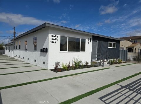 Photo of 1547 W 82nd Street, Los Angeles, CA 90047 (MLS # PW26026111)