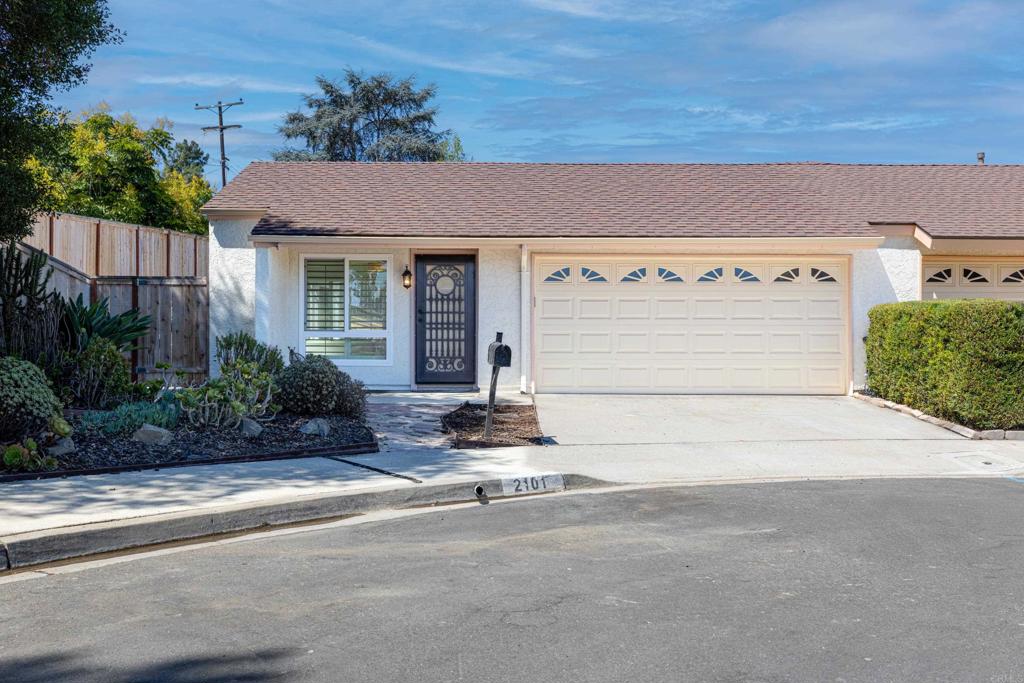 Light and bright single-level twin home located on a cul-de-sac. This open floor plan offers new paint throughout, new exterior stucco, dual pane windows, Saltillo tile and laminate flooring, plantation shutters, ceiling fans in each room, and new A/C unit. The kitchen features custom cabinetry, solid surface countertops, stainless steel appliances, and a large center island. Two full bathrooms, including a walk-in tiled shower in the primary suite with barn door entry. Additional highlights include crown moulding, solar, a spacious backyard and patio with aluminum wood-look cover, and a large grass area. The home also offers a 2-car attached garage. Community amenities include two pools and walking trails.