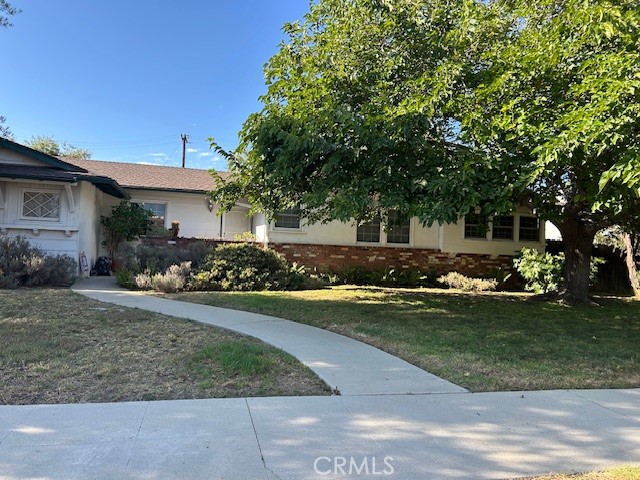 *** Charming Northridge Home with Pool & ADU Potential ***
Welcome to this lovingly maintained residence, cherished by the same family for the past 47 years. Nestled on a generous 10,834 sq. ft. corner lot in a sought-after Northridge neighborhood, this home offers timeless character and endless possibilities.
Step inside to a flowing 1,544 sq. ft. floor plan highlighted by an inviting mix of bamboo, hardwood, and plush carpet flooring. The spacious living room is filled with natural light from custom French doors and features a striking floor-to-ceiling brick fireplace with raised hearth—perfect for gatherings.
The kitchen provides ample cabinetry, generous counter space, and a lighted ceiling fan, seamlessly connecting to the dining area. A cozy den/office and a conveniently located laundry room with backyard access add to the home’s functionality.
There are 3 comfortable bedrooms, each with ceiling fans, plus 2¼ bathrooms—including a well-placed pool bath for easy outdoor entertaining.
Upgrades include dual-pane windows, copper plumbing, and a 2-year-old central air & heat system, ensuring efficiency and year-round comfort.
The private backyard is designed for relaxation and fun, featuring a covered patio, lush lawn, privacy fencing, and a sparkling re-plastered pool. With a side entrance, the attached 2-car garage is a great candidate for a JR. ADU conversion, and the expansive yard offers space for an additional ADU.
Located near award-winning schools—including Granada Hills Charter High School—as well as shopping, dining, and easy freeway access (118 & 405), this home combines convenience, comfort, and potential.
With its solid foundation and “great bones,” this is your opportunity to add your personal touch and create the oasis you’ve been dreaming of.
Call today to schedule your private showing!