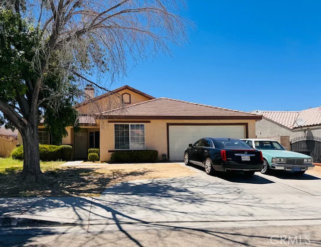 Welcome to 36641 Sulphur Springs Rd, a solidly built 4-bedroom, 2-bathroom home offering approximately 1,878 sqft of living space (built in 1993), set on a generous 7,900 sqft lot in East Palmdale This residence features an open contemporary floorplan, updated with designer two-tone paint and new carpeting throughout, as well as granite countertops in both the kitchen and bathrooms.Inside, you’ll enjoy refinished flooring, a dual-sided fireplace, and a spacious layout that flows easily from room to room. The kitchen is well-equipped with modern black appliances and laminate flooring accented by sleek cabinetry.Conveniently located within reach of shopping, public transportation, and freeway access, this property offers both opportunity and convenience. Whether you're looking to make it your home or invest in its potential, this East Palmdale gem is ready to shine