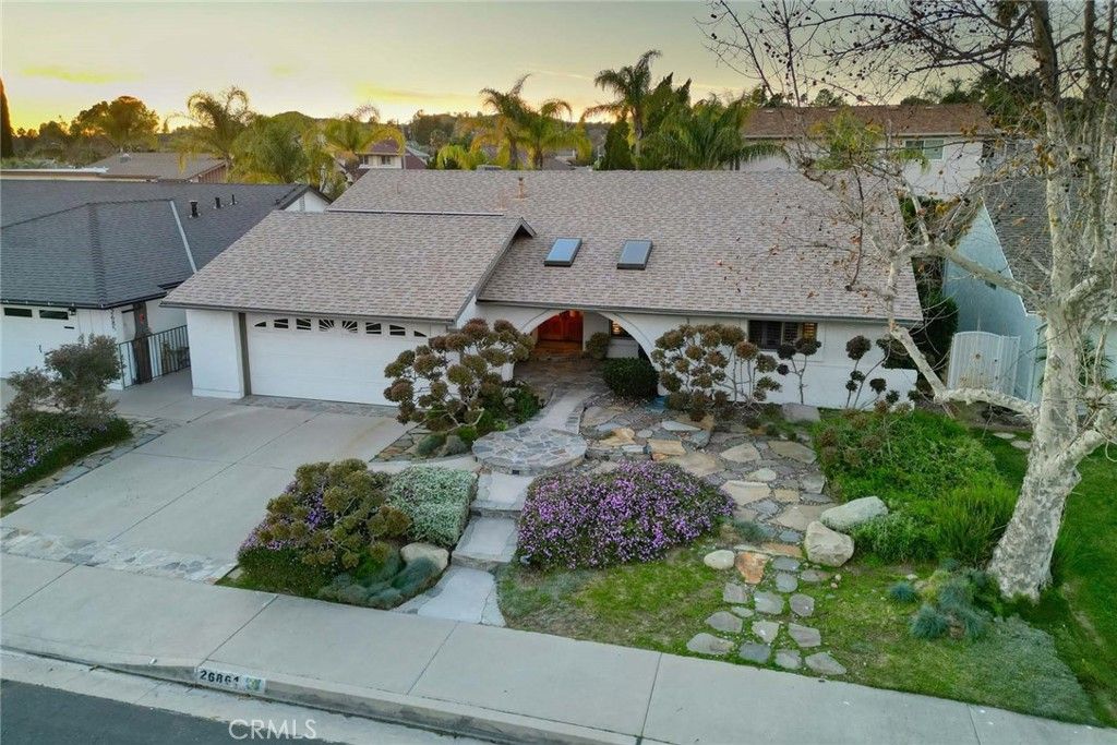 Photo of 26861 Cuatro Milpas St, Valencia, CA 91354 (MLS # GD26015568)