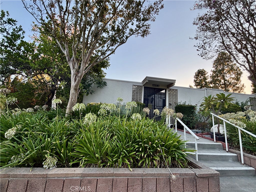 Welcome to the fabulous 55+ Community of Laguna Woods! This is a gorgeous single level 2 bedroom, 2 bath end-unit with an open-concept living room and beautifully updated. One of the most sought after and popular models inside the village. This high-end remodeled Cordoba located near the PAC (Clubhouse 3) from Gates 1-4. Enter through the wrought iron gate that opens to a spacious tiled private patio with a large storage closet. The spacious front patio is perfect for relaxing or entertaining. The entry door leads to open concept living room.The enclosed atrium adds valuable living space with skylights for abundant natural light. It opens to the spacious living room and connects to the primary bedroom. Beautiful wood floors throughout, crown molding, gorgeous kitchen with high end granite counter top & backsplash, large bedrooms, beautiful bathrooms. Central AC/Heat system for your all season comfortable living. Come and enjoy the resort living style of the Laguna Woods Village, Southern California Orange County’s best 55 plus active retirement community with numerous amenities: 5 swimming pools, 7 Clubhouses, 2 fitness centers, a 27 hole executive golf course with its own clubhouse & a 9 hole par 3 golf course, an equestrian center, wood workshop, a ceramic/sculpture studio with kiln, sewing room, tennis complex, and much more. Over 250 social clubs to join. Free bus service within the Village or to the nearby shopping & medical centers. 24 hour guard gated community for your safety, located close to freeways, medical facilities and approx. 6 - 7 miles to Laguna Beach.