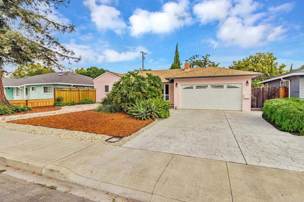Nestled on a peaceful street in the heart of Santa Clara, this inviting home offers the perfect balance of comfort, convenience, and future potential. Ideally located near major freeways, expressways, top tech employers like Nvidia, Intel and Apple, Levis Stadium, Santa Clara University, and premier shopping and dining at Valley Fair and Santana Row, it's truly at the center of it all. Set on a generous 5,940 Sq. Ft. lot, the property offers room to expand and low-maintenance landscaping in both front and back yards. Outdoor lovers will enjoy easy access to the San Tomas Aquino Creek Trail, which connects to the Bay Trail for biking to Sunnyvale, Mountain View, and beyond. Inside, the home features central heating and A/C, double-pane windows for energy efficiency, copper plumbing, and a 200-amp electrical panel. The living room includes recessed lighting, a fireplace and dining area. The remodeled kitchen is equipped with granite countertops, a deep sink, gas oven/range, microwave, refrigerator, disposal, and tile flooring. All this, plus low Santa Clara utility rates, makes this home a smart and stylish choice.