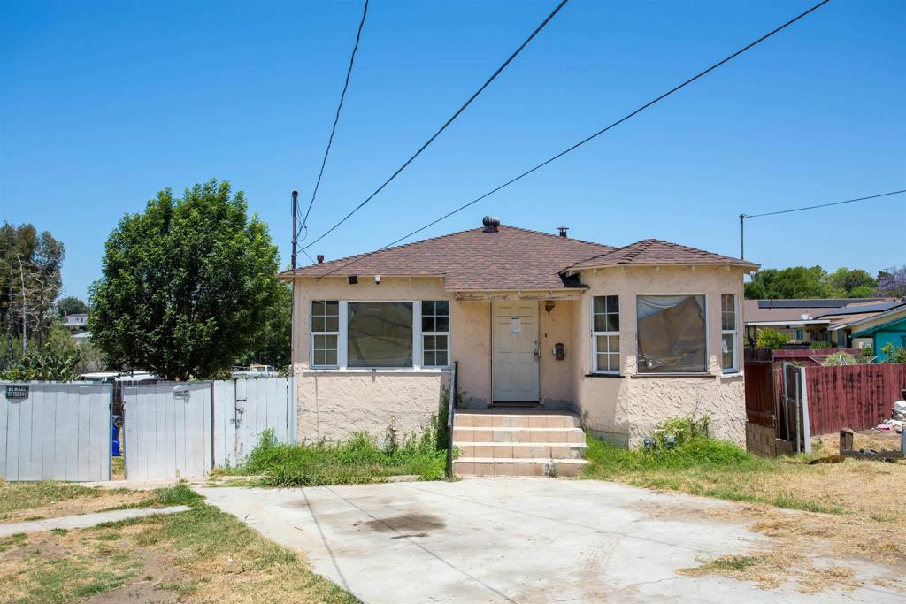 Great opportunity for fixer on large lot with plenty of room for parking. Gated and fenced yard with vehicle sized gate. Inside is a 2 bedroom 1 bath, living room and kitchen upstairs with a large mostly finished downstairs area. Bring your best ideas for this blank slate! This property is selling as-is with no repairs or credits, cash only. Sale is subject to CA Civil Code 2924 m/o.