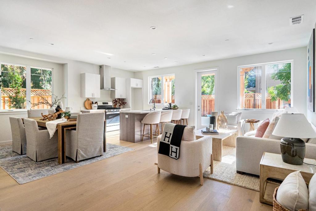 Last available unit in the complex! Unique and rare find two-story design with a backyard. A community for the modern lifestyle. 10 feet high ceilings and big windows make the whole house sunny and bright. High-end Spanish Cabinets. Ground floor features an open kitchen with great room and a junior master suite. Each room has its own bathrooms. Underground parking with prewire for electrical car charging, a storage room, and bicycle storage room. This community is situated in a quiet and established neighborhood. It is biking distance to Google and Caltrain Station, short walking distance to New Mountain View Elementary School and around the corner from cafes and restaurants. HOA fee is in the process of adjusting down.