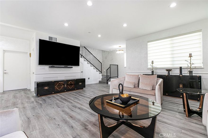 Priced significantly below market value! Welcome to this exceptional newly built home, a modern masterpiece showcasing contemporary elegance. Designed with an open concept layout, this residence offers a seamless flow between the living, dining, and kitchen area perfect for both everyday living and entertaining. Upstairs, you’ll find a well-thought-out floor plan featuring all four bedrooms, creating a private and peaceful space for rest and relaxation. Two of the bedrooms come complete with their own en-suite baths, blending convenience with luxury. The primary suite boasts a spacious walk-in closet, offering excellent storage and organization, along with a luxurious en-suite bath that enhances the comfort of your personal retreat. Step outside to your private patio, an ideal spot for morning coffee or relaxing evening gatherings. The kitchen is equipped with elegant quartz countertops and premium stainless steel appliances, combining sleek design with top-notch functionality. Additional features include solar panels. Solar is financed. Surrounded by an array of restaurants, shops, and schools, this newly built home offers the perfect blend of comfort, style, and convenience. Make it yours and elevate your lifestyle today.