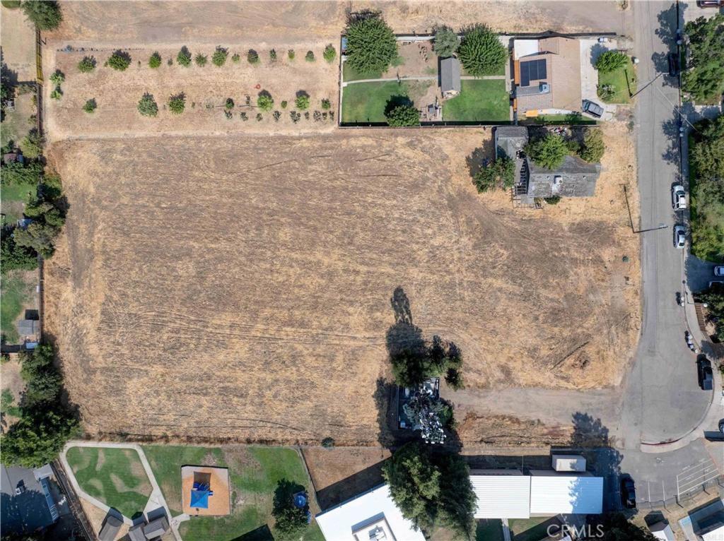 Builder/Investor Opportunity - This nearly 2-acre infill parcel with existing single family home is currently zoned R-1-10 with preliminary engineering for 5–6 buildable lots, each approved for a duplex with an ADU. That’s 15–18 units as-is, with the potential to accommodate 40+ units through a zoning change. 1490 Cameron Lane presents a rare chance to acquire a nearly 2-acre infill lot in a well-established residential area of Merced. With flat topography and utilities nearby, the site is well-positioned for development. The property offers flat topography, nearby utilities, and a well-established residential setting, making it ideal for a builder’s next residential project. Situated in a desirable neighborhood with convenient access to schools, shopping, and transportation, the site is well positioned for long-term value. Highlights: R-1-10 zoning with preliminary engineering for 5–6 lots Each lot supports a duplex + ADU (15–18 units total) Potential for 40+ units with rezoning Nearly 2 acres, flat topography, utilities nearby Rare infill parcel in established Merced neighborhood Buyer to verify all zoning, entitlements, and development potential with the City of Merced.
