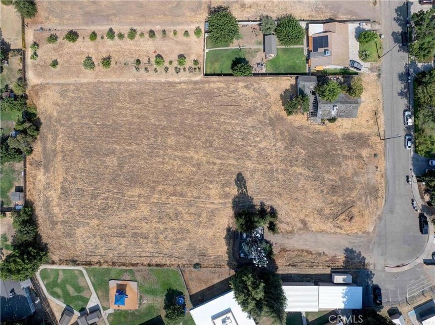 Builder/Investor Opportunity - This nearly 2-acre infill parcel with existing single family home is currently zoned R-1-10 with preliminary engineering for 5–6 buildable lots, each approved for a duplex with an ADU. That’s 15–18 units as-is, with the potential to accommodate 40+ units through a zoning change.  1490 Cameron Lane presents a rare chance to acquire a nearly 2-acre infill lot in a well-established residential area of Merced. With flat topography and utilities nearby, the site is well-positioned for development.  The property offers flat topography, nearby utilities, and a well-established residential setting, making it ideal for a builder’s next residential project. Situated in a desirable neighborhood with convenient access to schools, shopping, and transportation, the site is well positioned for long-term value.  Highlights:  R-1-10 zoning with preliminary engineering for 5–6 lots  Each lot supports a duplex + ADU (15–18 units total)  Potential for 40+ units with rezoning  Nearly 2 acres, flat topography, utilities nearby  Rare infill parcel in established Merced neighborhood  Buyer to verify all zoning, entitlements, and development potential with the City of Merced.