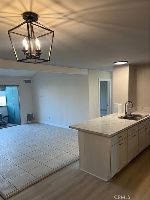 Photo of 15321 Santa Gertrudes Ave #J210, La Mirada, CA 90638 (MLS # DW26004041)