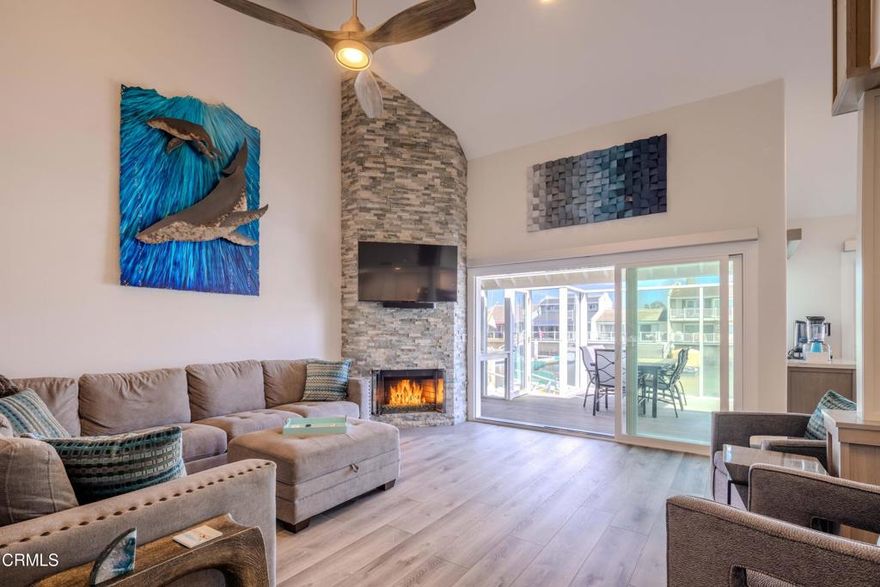 Stunning Fully Furnished Boat Dock Home in Channel Islands Harbor, Oxnard, CA Welcome to your dream home! This exquisite 3-bedroom, 2.5-bathroom fully furnished home is perfectly nestled in the picturesque Channel Islands Harbor, offering breathtaking waterfront views and an array of amenities for an unforgettable experience. Enjoy the comfort of air conditioning throughout the home, ensuring a cool retreat after a day of adventure. The open concept living area is adorned with smart TVs and a state-of-the-art Sonos sound system, providing the perfect ambiance for relaxation or entertaining friends and family. The modern kitchen is ideal for culinary enthusiasts, while the elegant dining table seats up to 10 people, making it perfect for hosting memorable dinners with loved ones. The primary bedroom, located on the first floor, features a European king-sized bed, his and hers closets, and a luxurious walk-in shower as well as a ceiling fan and 65'smart TV. Upstairs, the second bedroom boasts a cozy queen bed, TV, ceiling fan and a small balcony to enjoy your morning coffee while soaking in the views. It also has a walk-in closet. The third bedroom features two twin beds, perfect for kids or guests, along with a TV and ceiling fan for added comfort. Step outside to discover your private outdoor paradise! Unwind around the fire pit, grill up a feast on the BBQ or watch a football game on the smart TV. Enjoy the fresh air on the expansive patio or 40 ft boat dock. You can also enjoy the enclosed front courtyard to relax and listen to the sound of the birds. For the adventurous spirit, this home includes two kayaks, two paddle boards, and three beach cruisers for tenant enjoyment. Explore the stunning coastline or take a leisurely ride through the scenic neighborhoods. The property is equipped with a camera system (no cameras inside), providing peace of mind while you relax and enjoy your stay. This fully furnished boat dock home is not just a place to stay; it's a lifestyle experience waiting for you. Whether you're looking for a relaxing retreat or an adventure-filled vacation, this stunning home in Channel Islands Harbor is your perfect escape. Don't miss out on this incredible opportunity! 3-month lease minimum. Priced at $7,689 monthly.