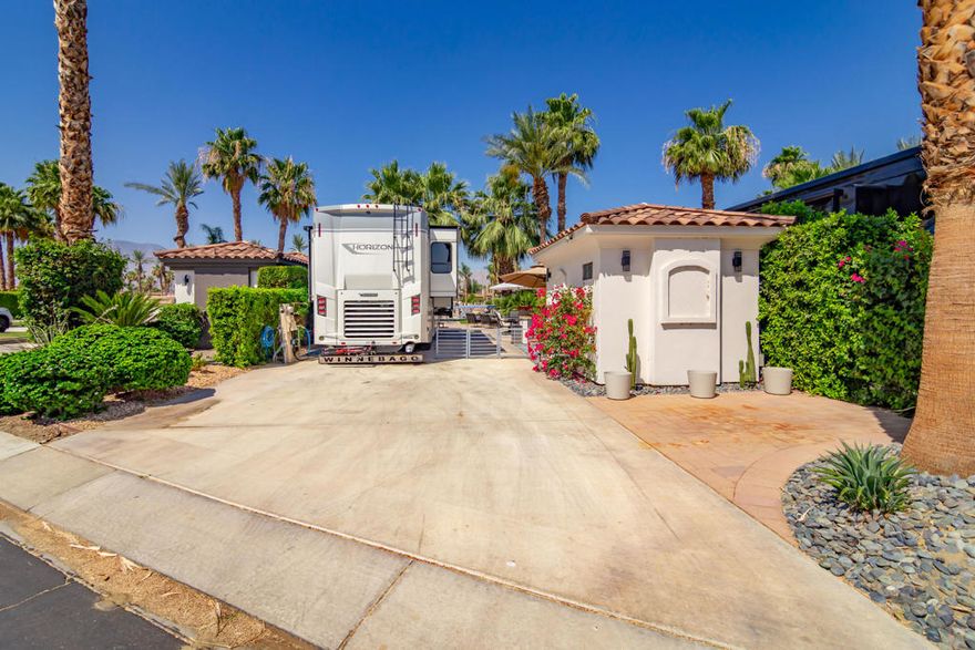Lot 339 at Motorcoach Country Club in Indio, California, is a rare waterfront opportunity featuring a private boat dock, upgraded casita, and luxury outdoor living space--all set within one of the Coachella Valley's most prestigious Class A motorcoach resorts. This premium lot offers a turnkey experience with a fully equipped BBQ island, fire table, and lounge area perfect for entertaining or relaxing by the water. The detached casita includes a full bathroom, new Samsung SMART washer and dryer, and ample storage, making it ideal for guests or extended stays. Privacy landscaping, gated access, and a professionally installed invisible pet fence enhance both security and serenity. As a resident, you'll enjoy exclusive access to Motorcoach Country Club's world-class amenities, including a renovated clubhouse with fine dining, scenic boating canals, three resort-style pools, a 9-hole golf course, pickleball and tennis courts, and a state-of-the-art fitness center. Lot 339 is ideal for buyers seeking a luxury motorcoach lifestyle in Southern California's sought-after Indio resort community. MCC accommodates Class A motorhomes (30'-45'). Per zoning, on-site structures are not dwellings and overnight stays are not permitted. Annual Food & Beverage minimum: $2,080.