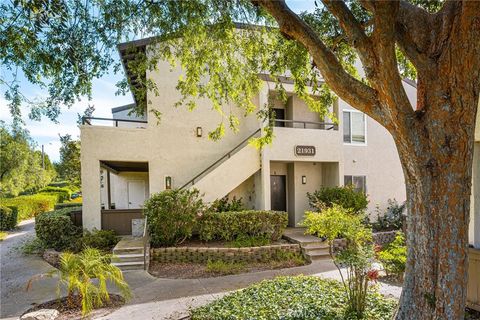 Photo of 21931 Rimhurst Dr #117, Lake Forest, CA 92630 (MLS # OC26072741)