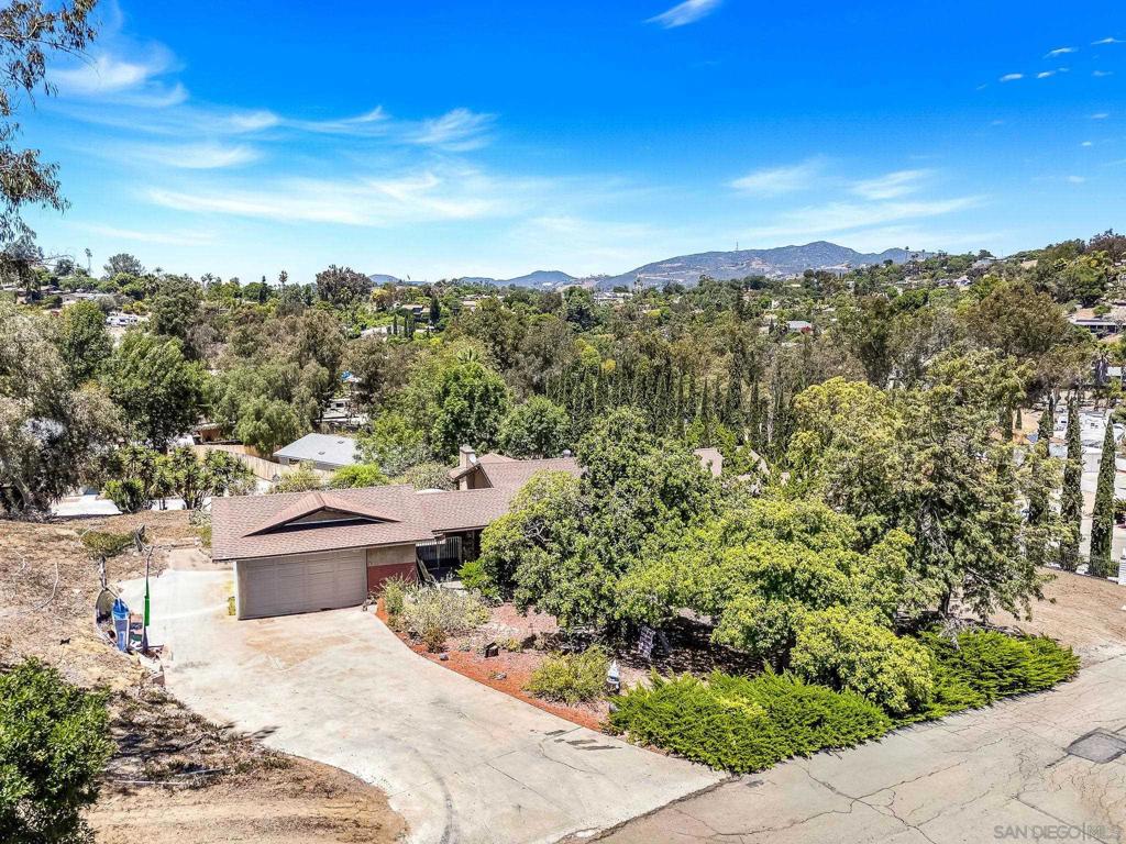 Amazing opportunity to own a HUGE lot with breathtaking panoramic views in a sought-after Vista neighborhood just minutes from the vibrant energy of downtown. Sitting on just under an acre of private, usable land with approx. 240 feet of street frontage, this property offers easy-in, easy-out access for everything: RVs, boats, horses, trailers, or all your toys. Thinking about adding an ADU? There's plenty of room. Craving more space and privacy? You’ve got it. This is your blank canvas for whatever dream you’re ready to build. Home in need of TLC so bring your ideas and vision. Inside features 4 bedrooms and 3 bathrooms with one bedroom and a full bath on the lower level with separate entrance. Ideal for converting into an in-law suite, home office, creative studio, or rental unit. This one-of-a-kind property is SoCal living at its best — space, views, flexibility, and location all in one. Don’t miss this rare chance to create something truly special. The seller has never occupied the property and has very limited knowledge of property condition or history. All measurements are approximate. Buyer's and Buyer's Broker/Agent should verify measurements and complete thorough inspections and investigations prior to Close of Escrow to satisfy themselves with the current condition of the property. Buyer(s) to verify and approve all data, reports, records, inspections, permits, MLS, HOA, if applicable and all information pertaining to the property prior to removal of contingencies. All contracts/offers are subject to seller approval and any offers or counteroffers by seller are not binding unless the entire agreement is ratified by all parties.