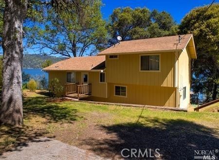 A great escape. Located at the end of a well maintained private road. This 3 bedroom 2 bathroom is waiting for the perfect lake family looking to live or vacation. The community here looks out for each other and it has a community first vibe. Absolutely stunning views from the back deck overlooking beautiful Clearlake. The boat dock and boat lift have been well maintained.
