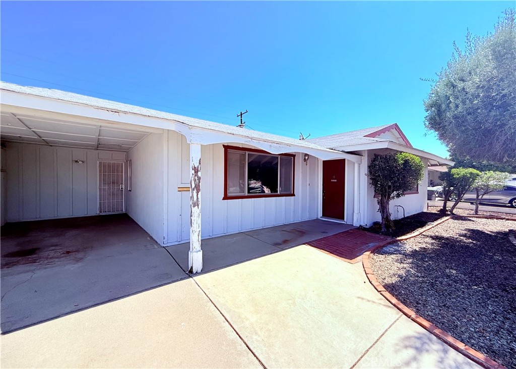 27294 Pinehurst Road is a charming home in the vibrant 55+ Sun City community of Menifee, CA. This residence offers 1,404 square feet of comfortable living space, featuring an open-concept layout with a spacious living room, kitchen, and dining area. With two bedrooms, a versatile den, and two bathrooms, the home boasts a generous amount of space. The large backyard, ideal for entertaining, includes a covered patio and low-maintenance landscaping. Additional amenities include covered parking and a convenient location near shopping, dining, and parks, making this home a perfect blend of comfort and community.